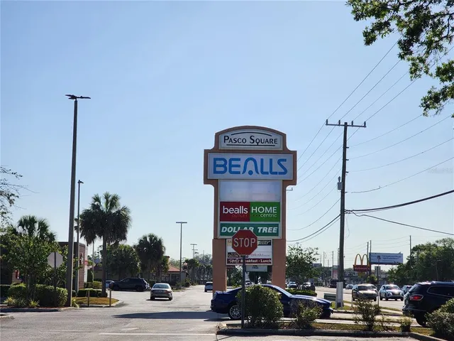 a view of car parked on the side of the road