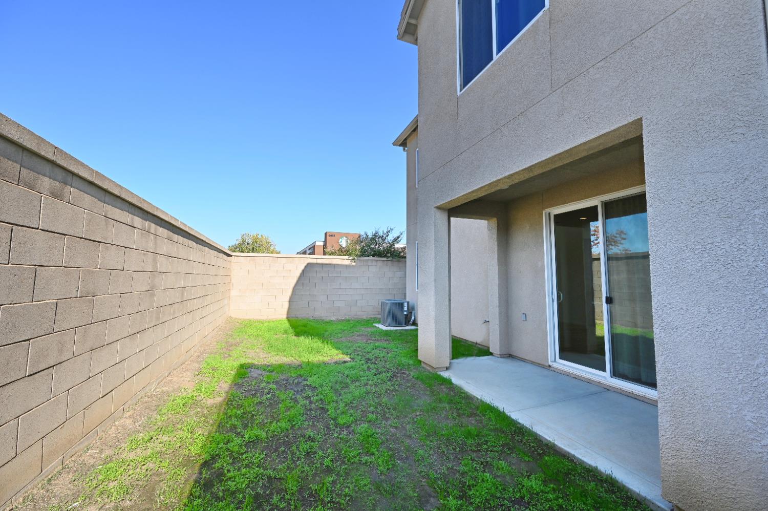 891 North Terra Cotta Drive Fresno, CA 93727 - Photo 30 of 32 a view of a back yard of the house