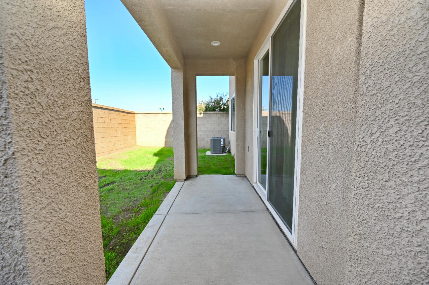 891 North Terra Cotta Drive Fresno, CA 93727 - Photo 31 of 32 a view of a porch with a big yard and potted plants