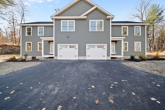 a view of an house with a street