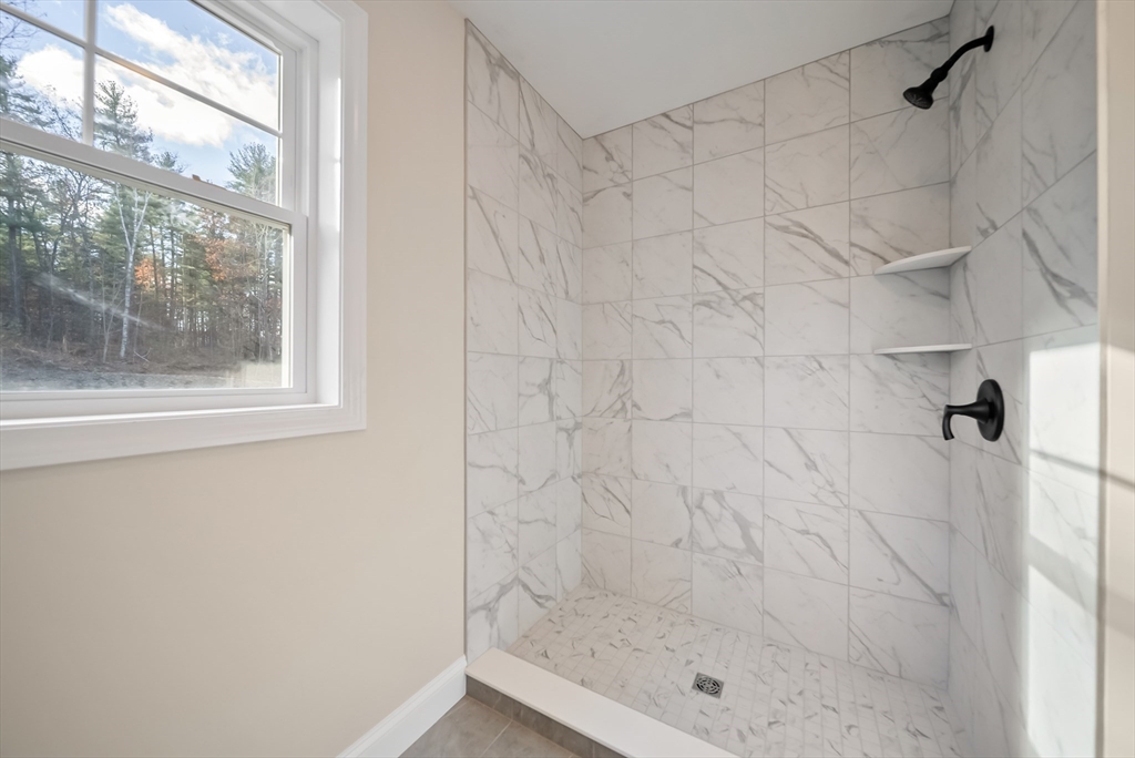 53 Kimball Hill Road, Unit A Hudson, NH 03051 - Photo 23 of 41 a bathroom with a shower