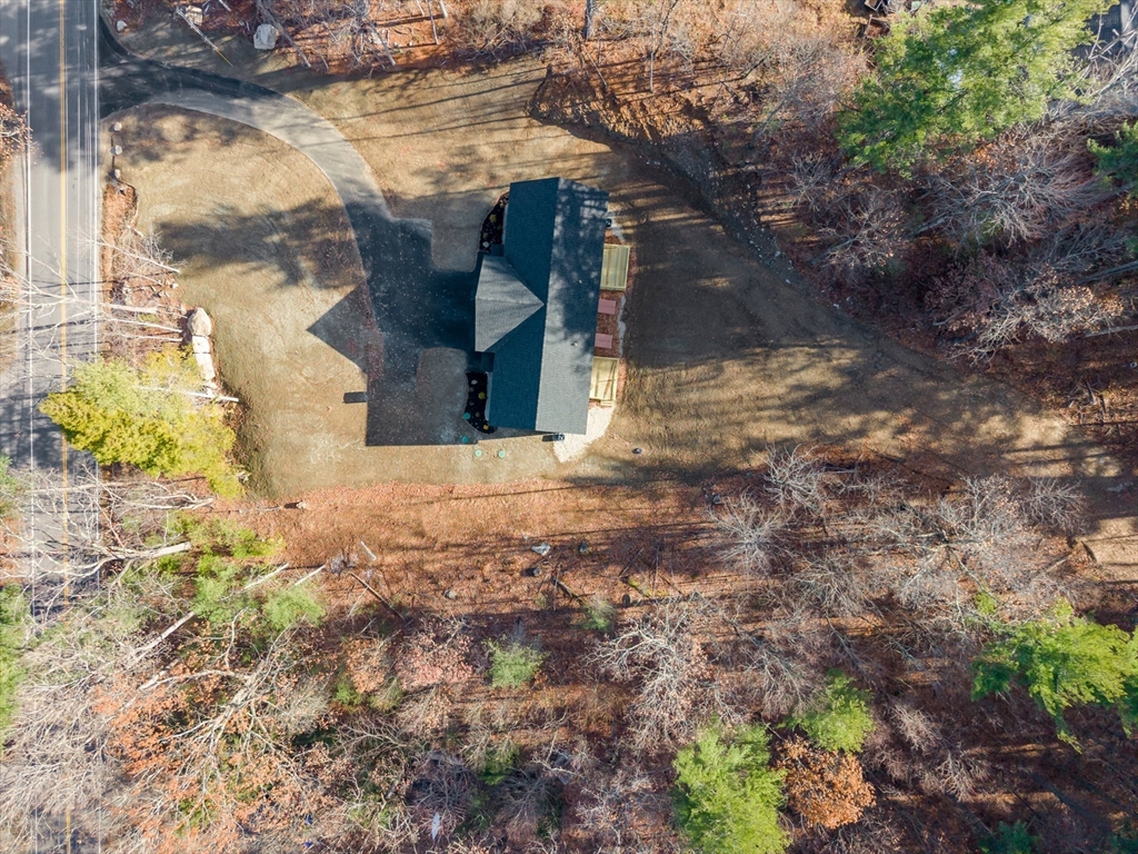 53 Kimball Hill Road, Unit A Hudson, NH 03051 - Photo 37 of 41 a view of a house with a yard