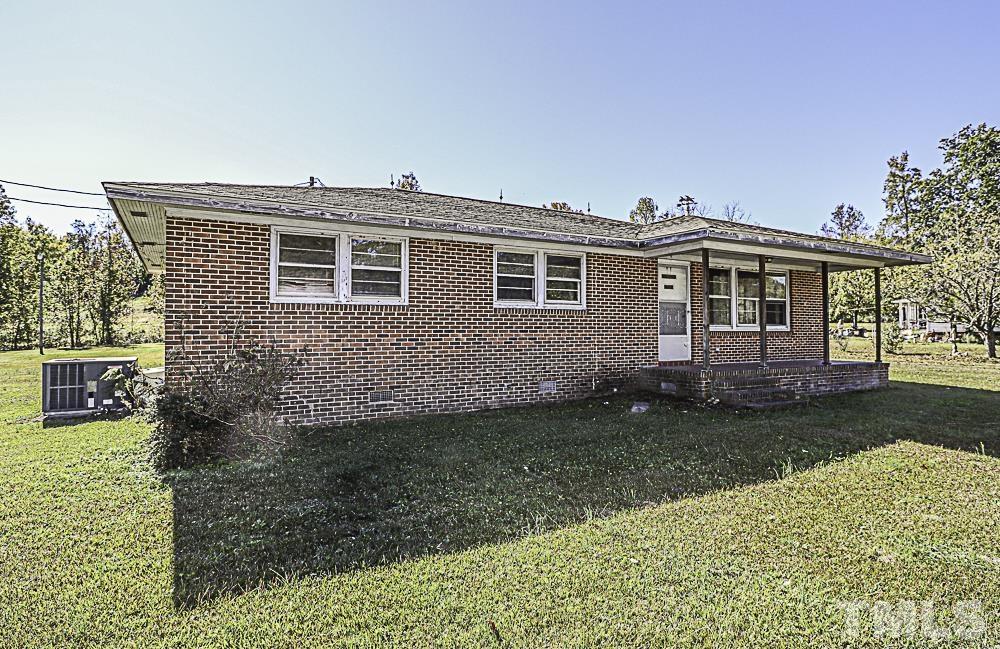 2508 Highway 42 Macclesfield, NC 27852 - Photo 2 of 24 a front view of a house with garden