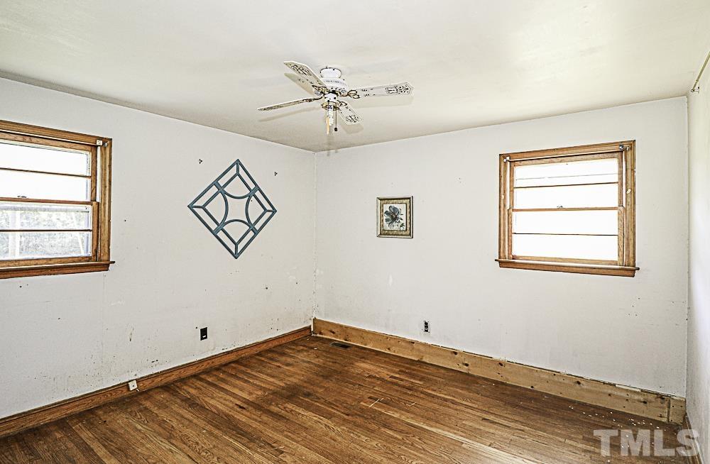 2508 Highway 42 Macclesfield, NC 27852 - Photo 24 of 24 a view of a room with wooden floor and white walls