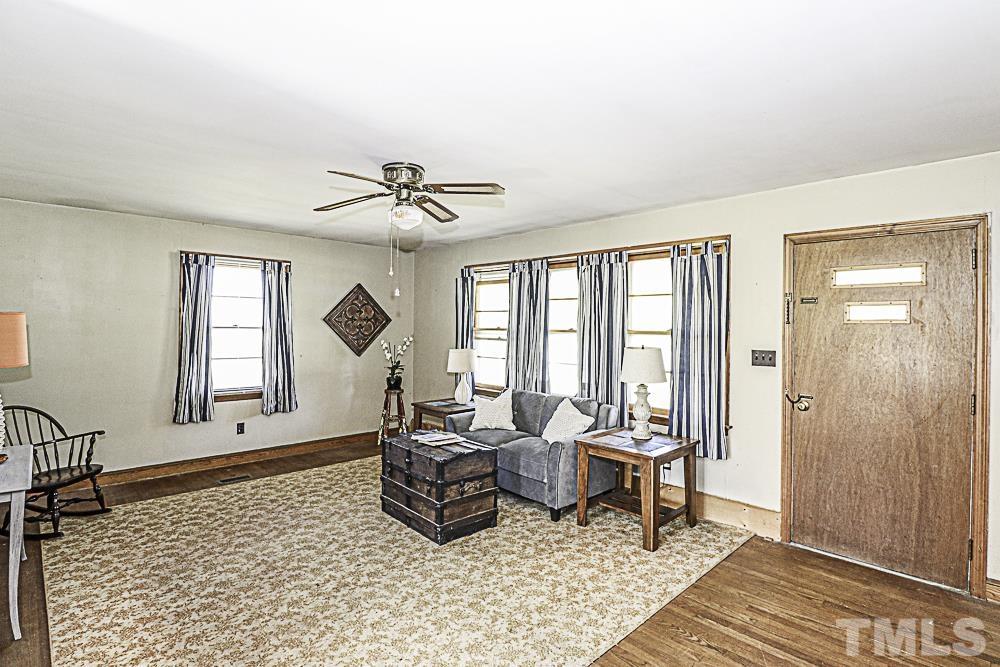 2508 Highway 42 Macclesfield, NC 27852 - Photo 6 of 24 a living room with furniture and a window