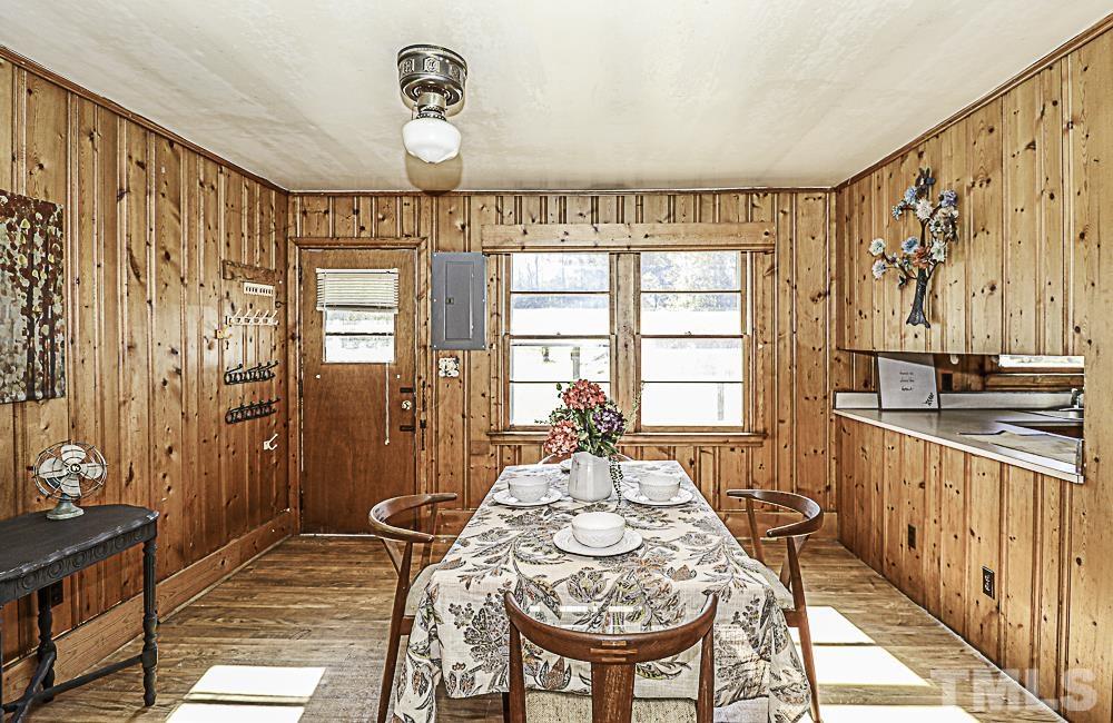 2508 Highway 42 Macclesfield, NC 27852 - Photo 10 of 24 a view of a dining room with furniture window and wooden floor