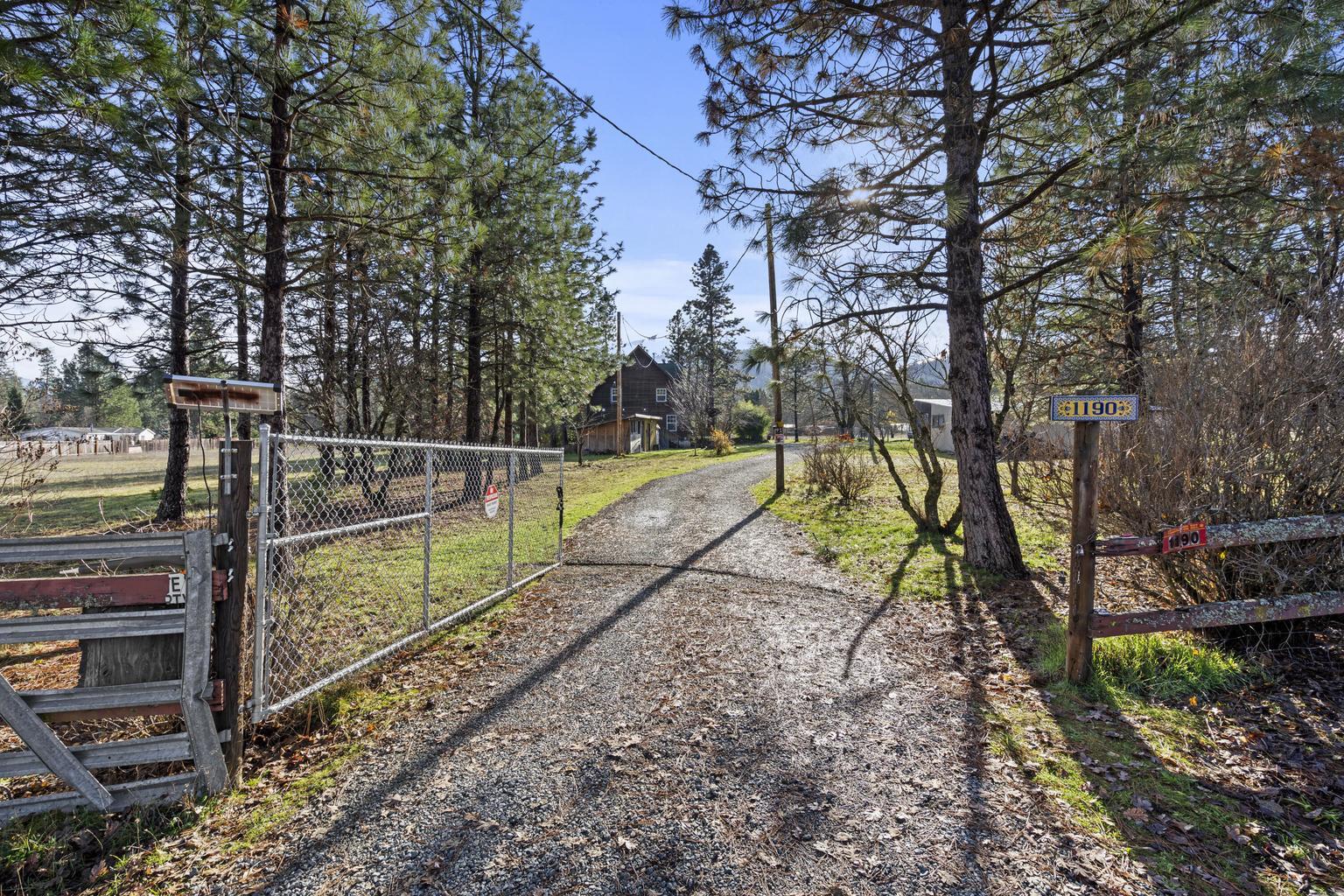 1190 Cedar Flat Road Williams, OR 97544 - Photo 31 of 45 a view of a park with swings