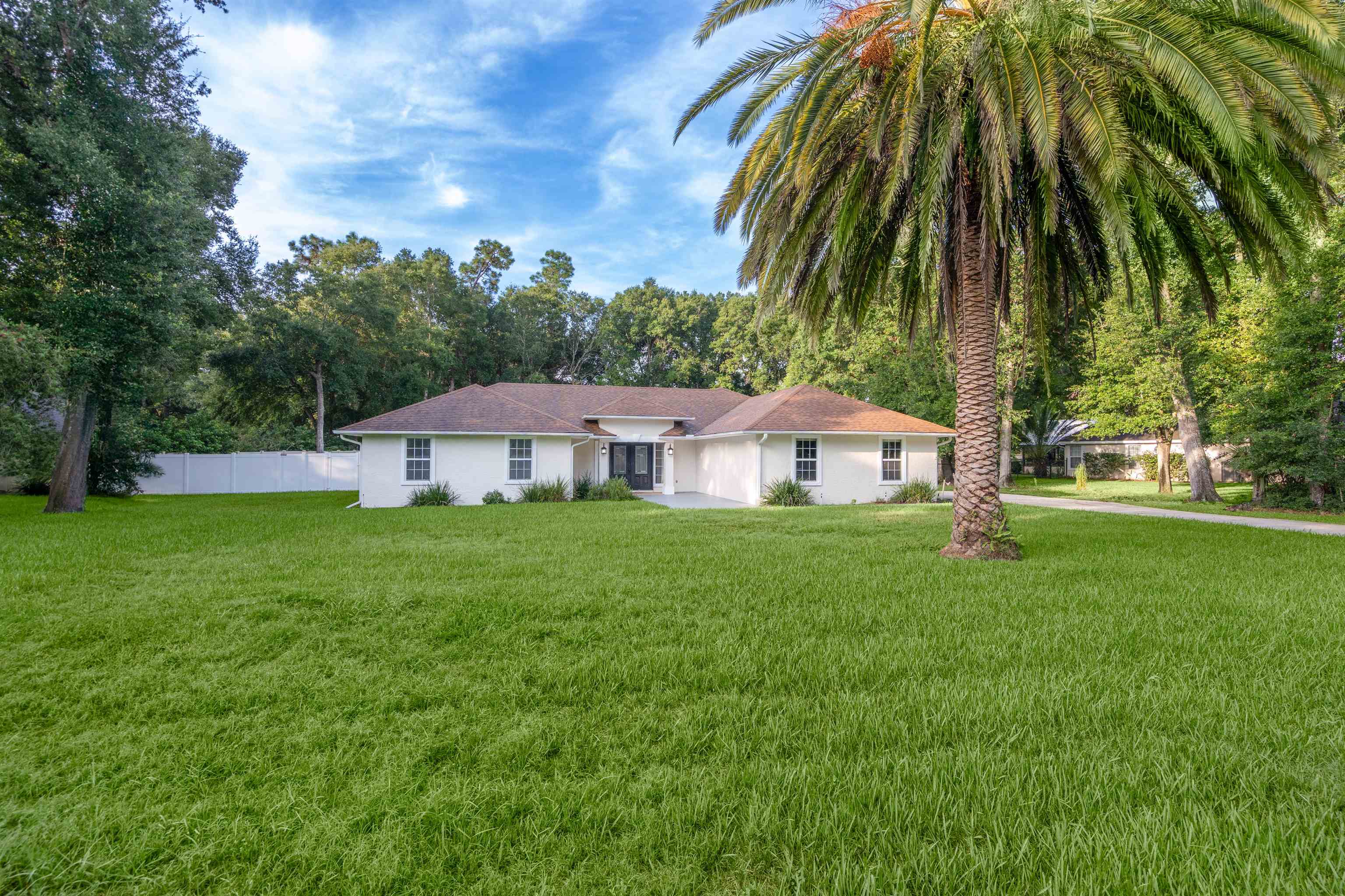 3508 Kings Road South St. Augustine, FL 32086 - Photo 2 of 32 a view of a house with a yard