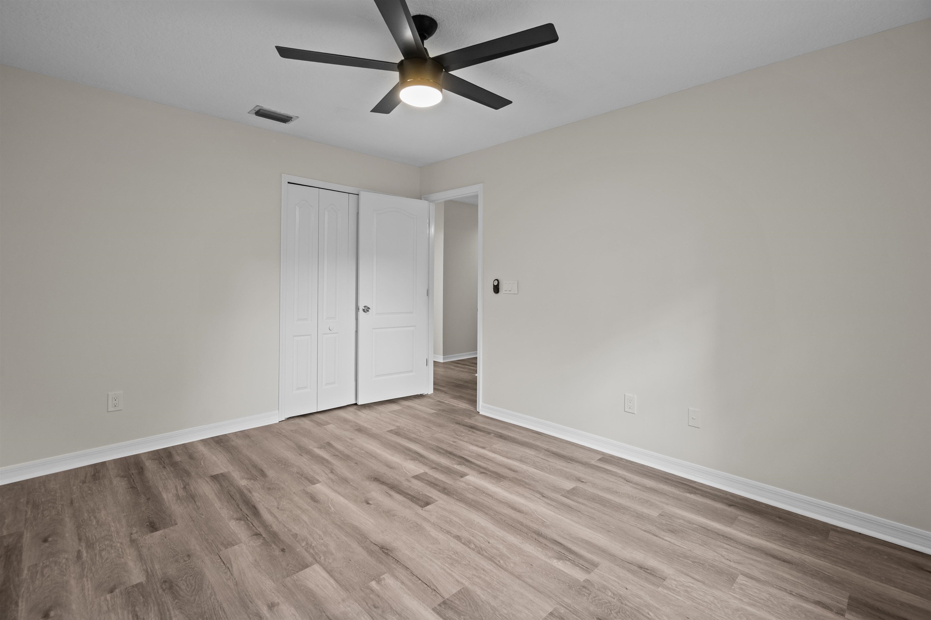 3508 Kings Road South St. Augustine, FL 32086 - Photo 23 of 32 wooden floor in an empty room