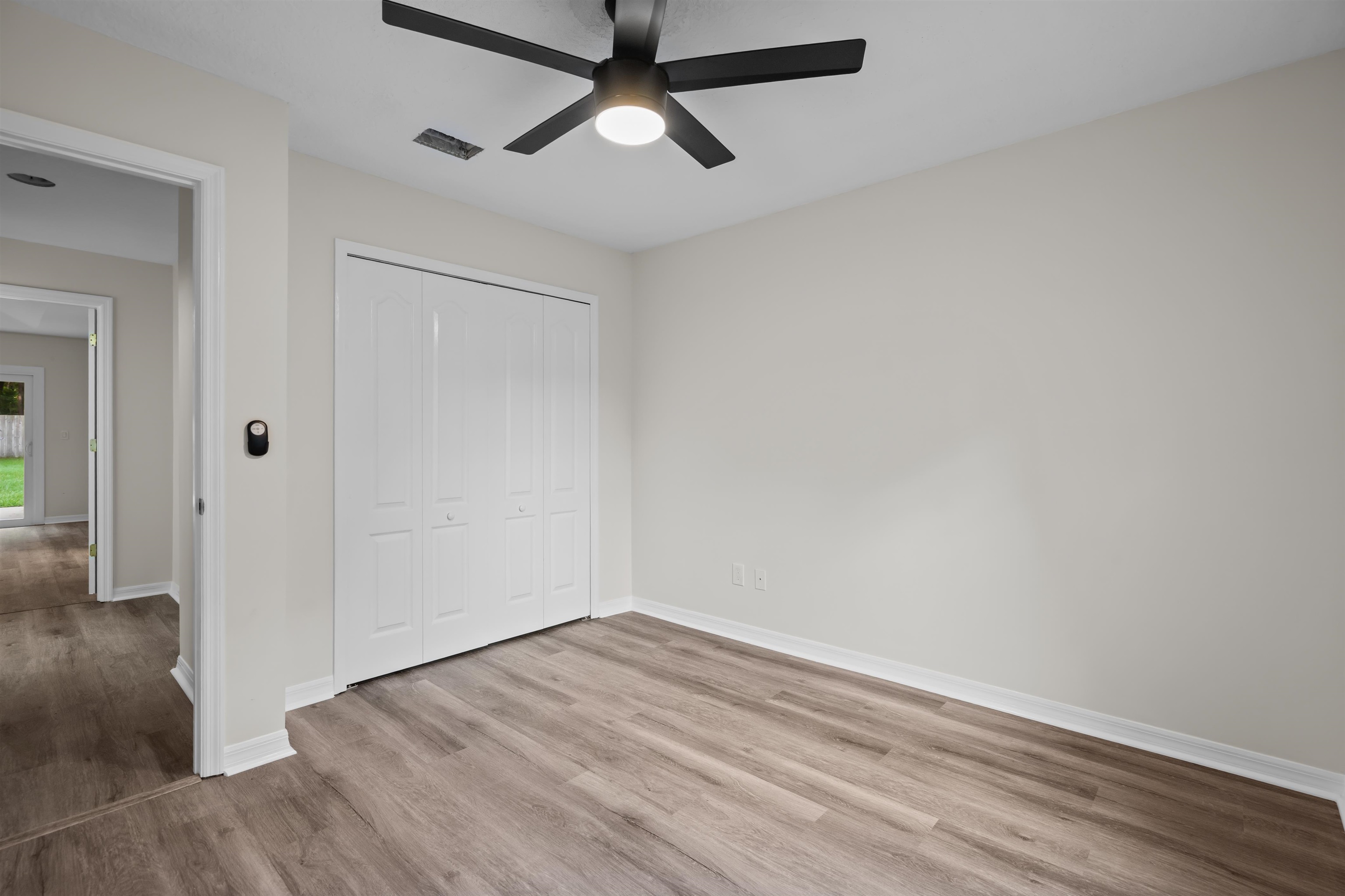 3508 Kings Road South St. Augustine, FL 32086 - Photo 25 of 32 wooden floor in an empty room