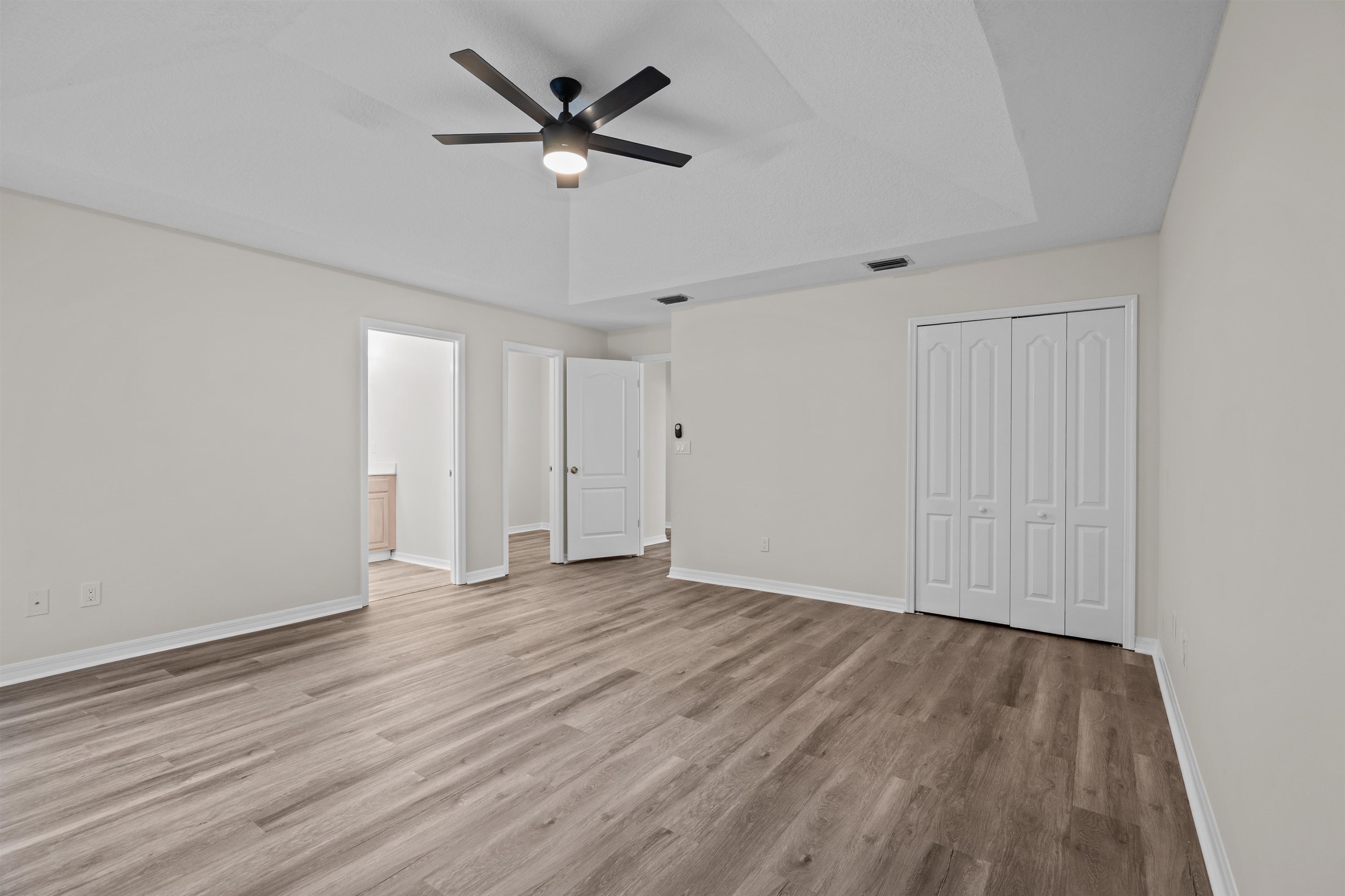 3508 Kings Road South St. Augustine, FL 32086 - Photo 30 of 32 a view of an empty room with wooden floor