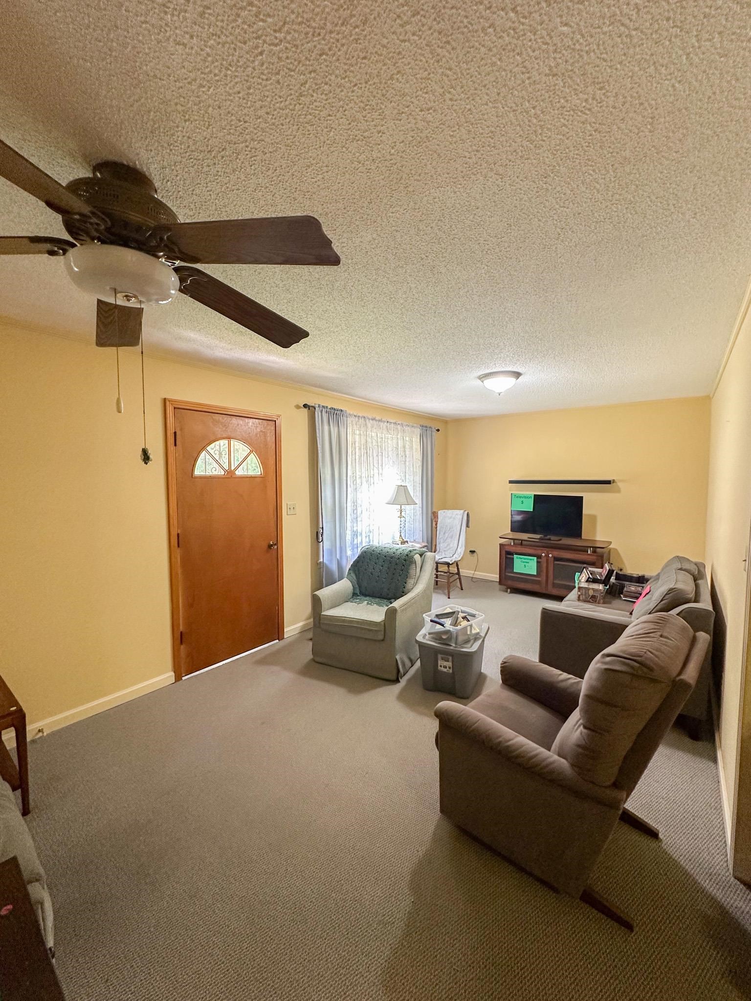 1630 Pleasant Hill Road Iuka, MS 38852 - Photo 7 of 14 a living room with furniture and a window