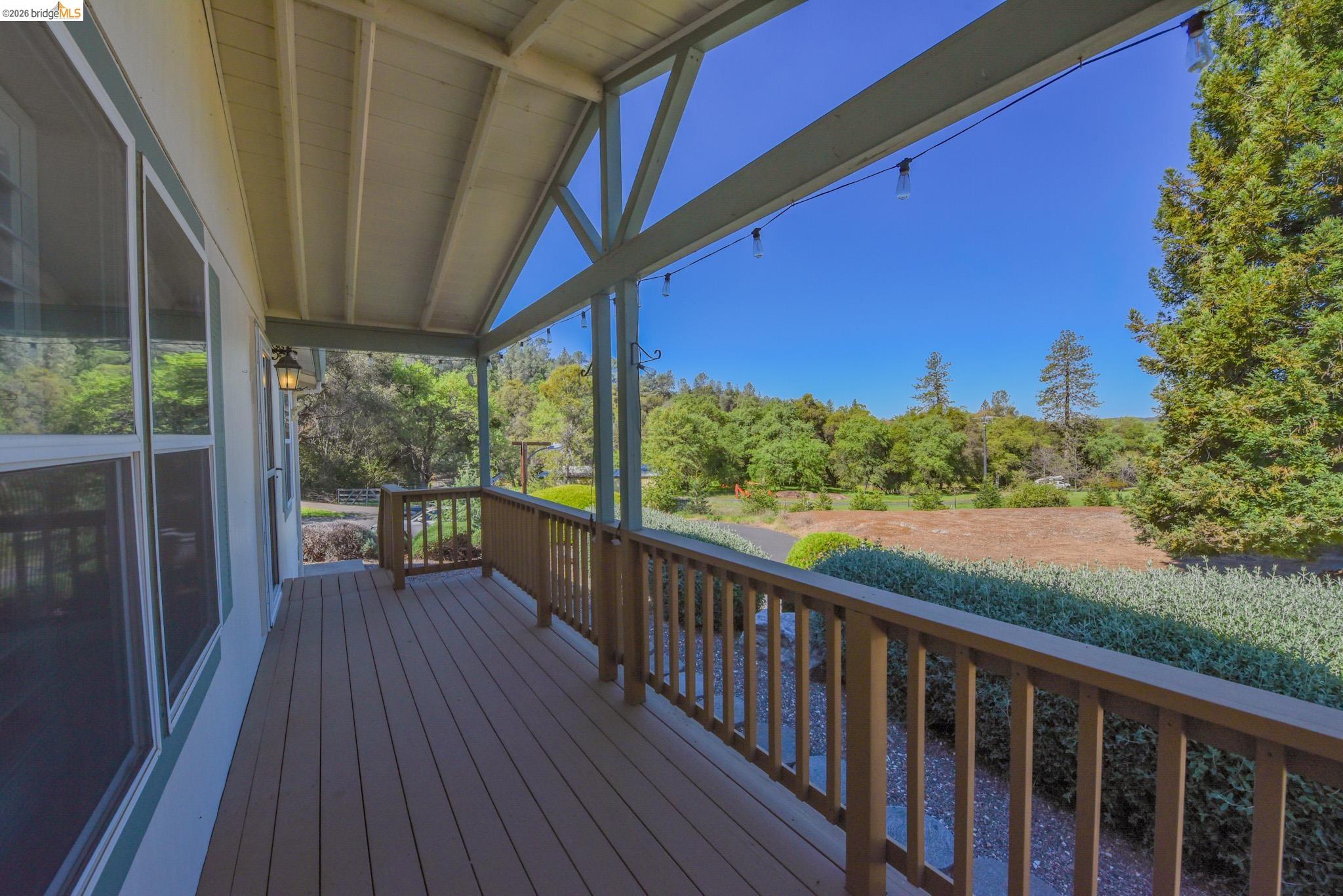 23732 Parrotts Ferry Road, Unit 47 Columbia, CA 95310 - Photo 5 of 21 a view of a balcony with wooden floor