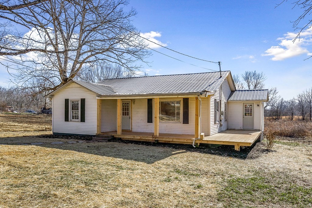 8626 Bockman Way Sparta, TN 38583 - Photo 2 of 25 a house view with a backyard
