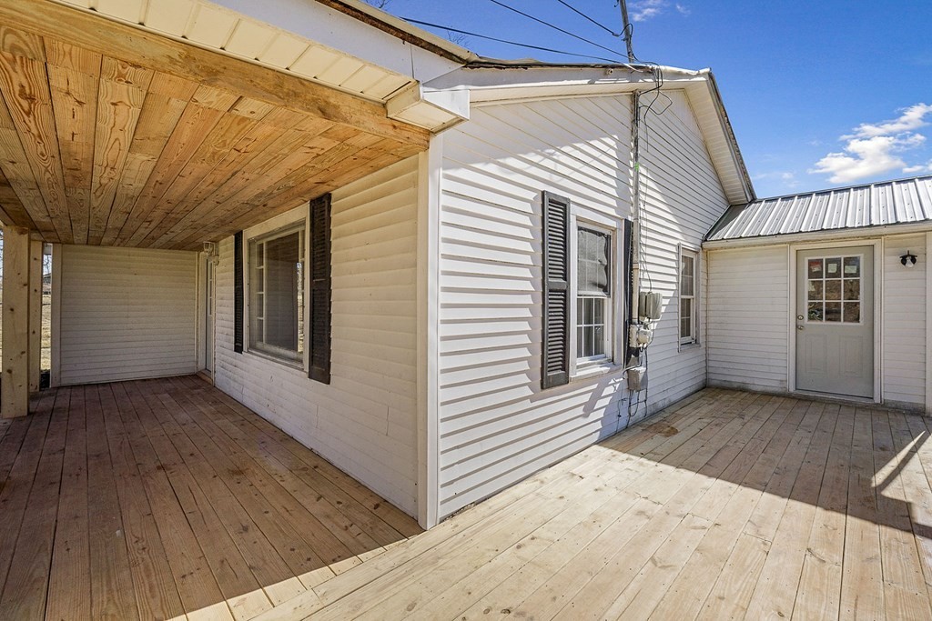 8626 Bockman Way Sparta, TN 38583 - Photo 22 of 25 a view of a house with a wooden deck