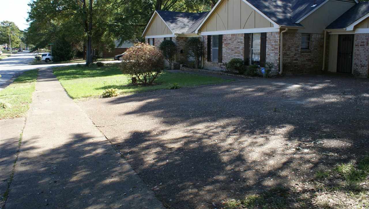 6205 Ridge Manor Drive Memphis, TN 38115 - Photo 3 of 8 a front view of a house with yard