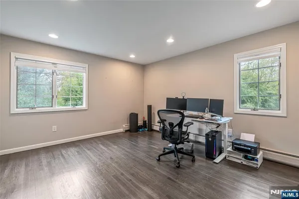 a workspace with furniture and a window