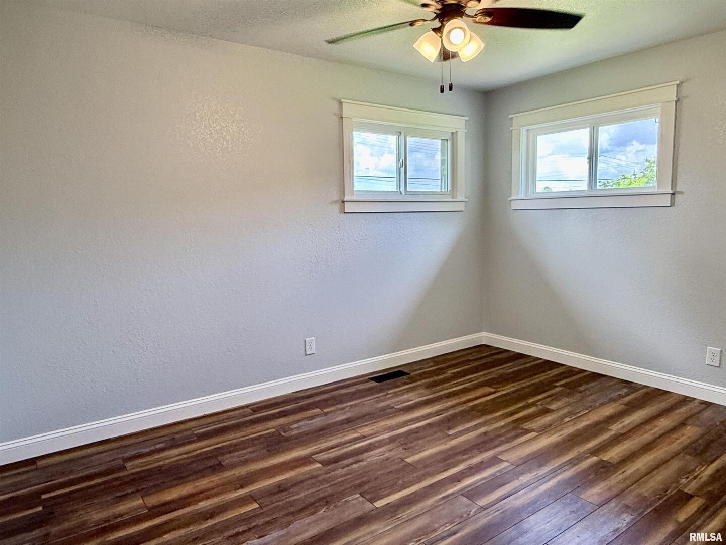 744 Airport Road Metropolis, IL 62960 - Photo 19 of 33 a view of room with window and ceiling fan