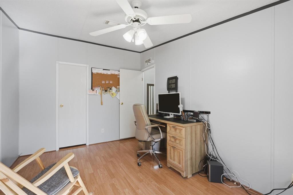 20082 County Road 304 Abilene, TX 79601 - Photo 20 of 36 a view of a workspace with furniture and a window