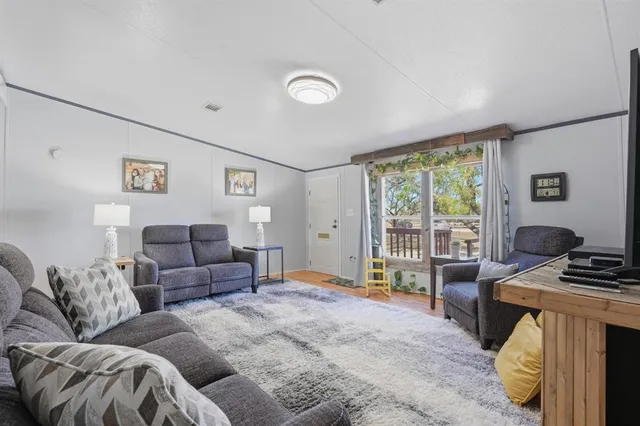 a living room with furniture and a couch