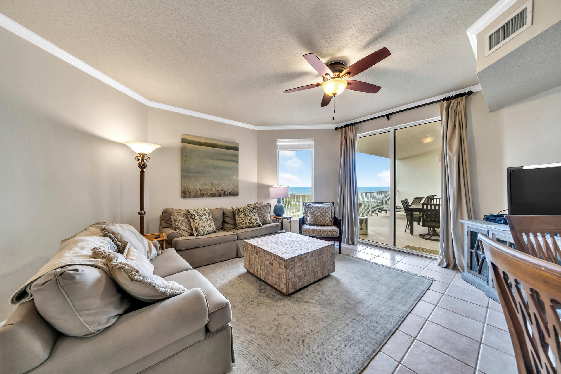 15 Chivas Lane, Unit 303A Santa Rosa Beach, FL 32459 - Photo 20 of 62 a living room with furniture and a flat screen tv with wooden floor