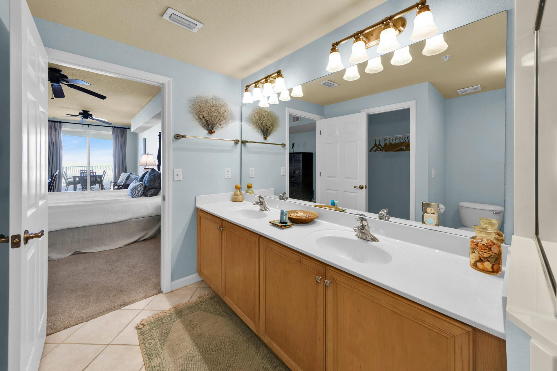 15 Chivas Lane, Unit 303A Santa Rosa Beach, FL 32459 - Photo 38 of 62 a bathroom with a sink double vanity and a mirror