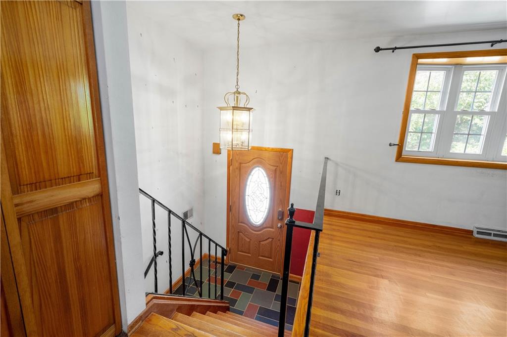 206 Hillendale Road Pittsburgh, PA 15237 - Photo 3 of 30 a view of a hallway with wooden floor windows and entryway