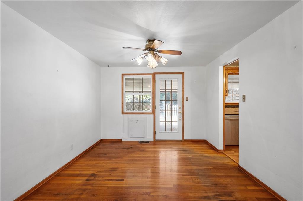 206 Hillendale Road Pittsburgh, PA 15237 - Photo 7 of 30 wooden floor in an empty room with a window