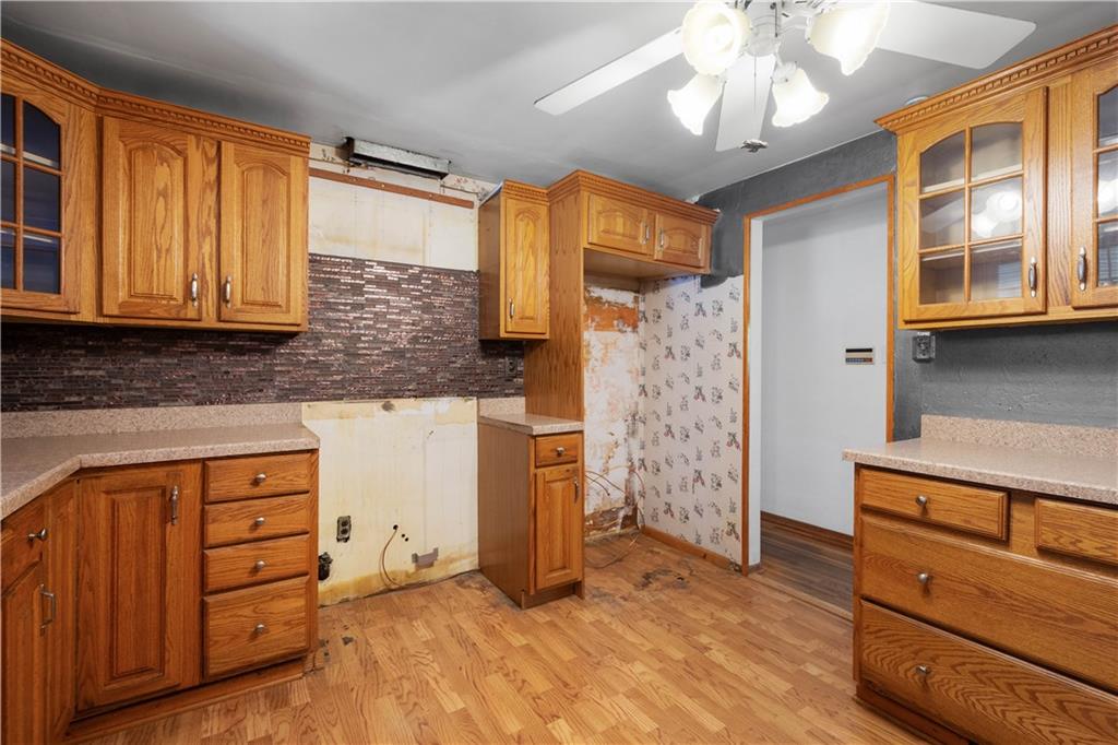 206 Hillendale Road Pittsburgh, PA 15237 - Photo 8 of 30 a kitchen with a refrigerator and a sink