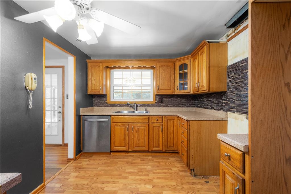 206 Hillendale Road Pittsburgh, PA 15237 - Photo 9 of 30 a large kitchen with stainless steel appliances granite countertop a sink and a stove