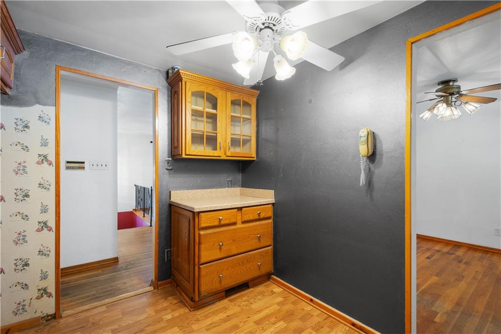 206 Hillendale Road Pittsburgh, PA 15237 - Photo 10 of 30 a bedroom with a bed and a chandelier