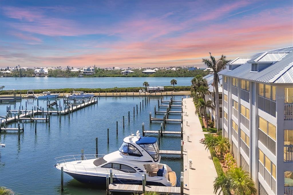 a view of a lake with sitting area
