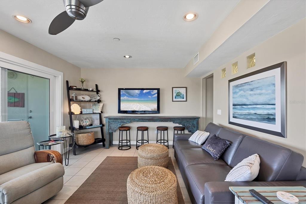7070 Placida Road, Unit 1230 Placida, FL 33946 - Photo 17 of 60 a living room with furniture and wooden floor