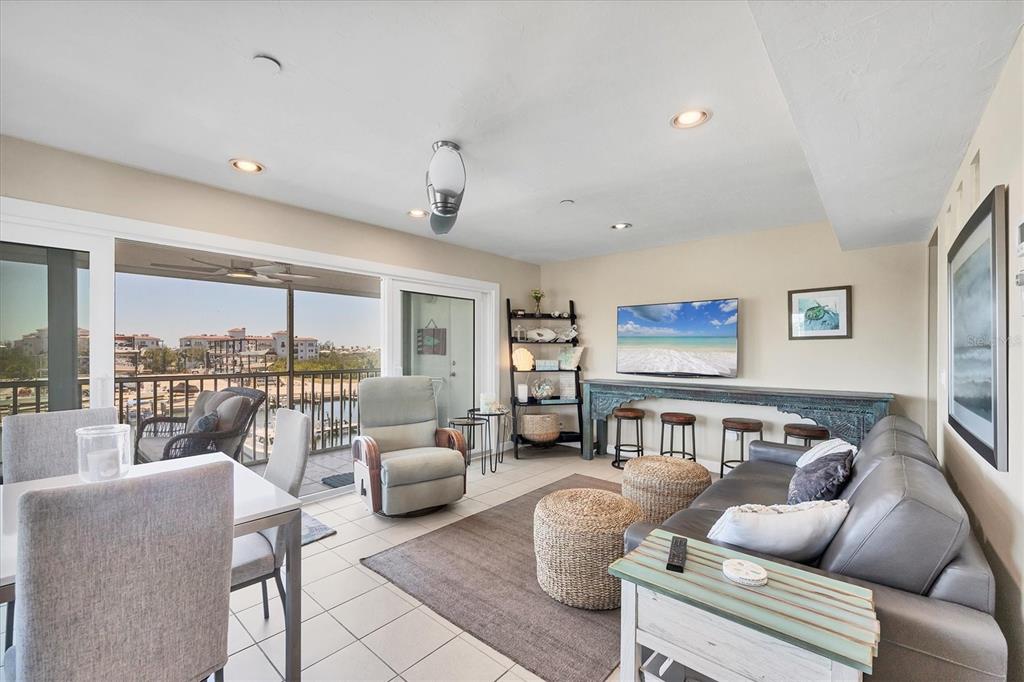 7070 Placida Road, Unit 1230 Placida, FL 33946 - Photo 18 of 60 a living room with furniture and a table