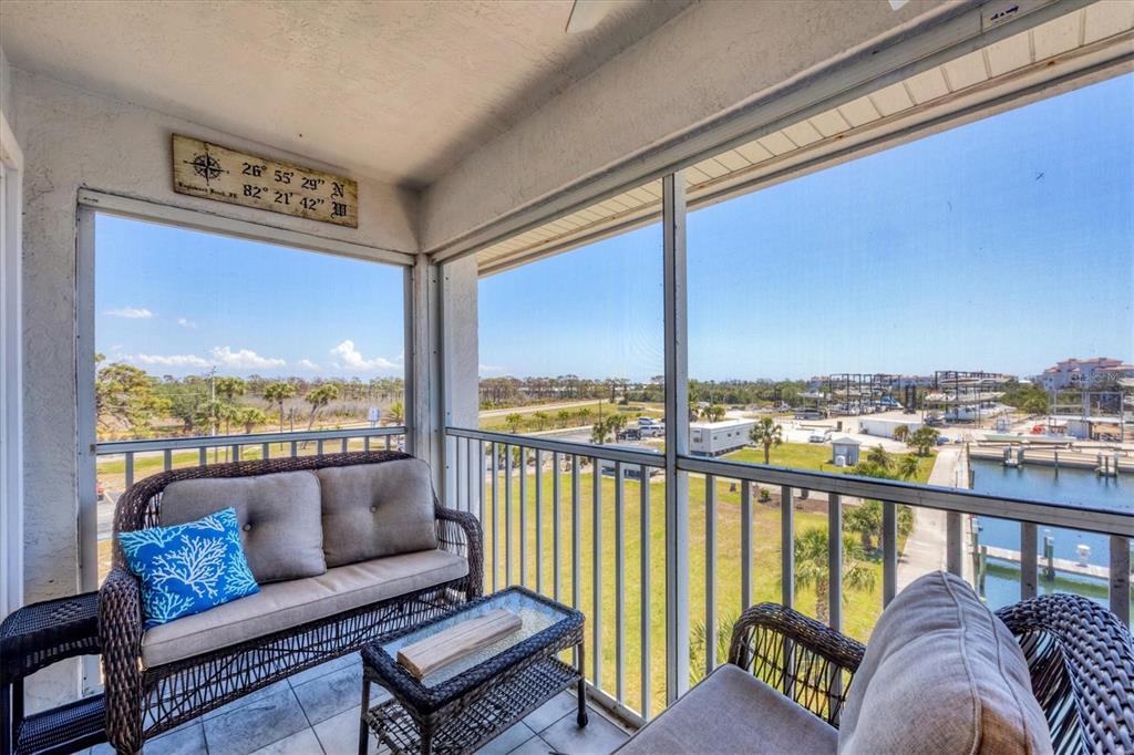 7070 Placida Road, Unit 1230 Placida, FL 33946 - Photo 41 of 60 a view of a city from a balcony