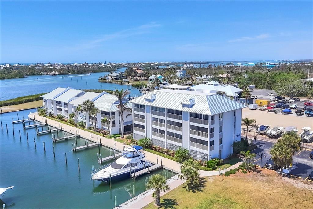 7070 Placida Road, Unit 1230 Placida, FL 33946 - Photo 49 of 60 a view of a lake with a city skyline in the background