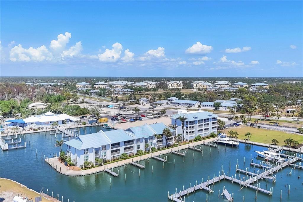 7070 Placida Road, Unit 1230 Placida, FL 33946 - Photo 50 of 60 a view of a city with lawn chairs