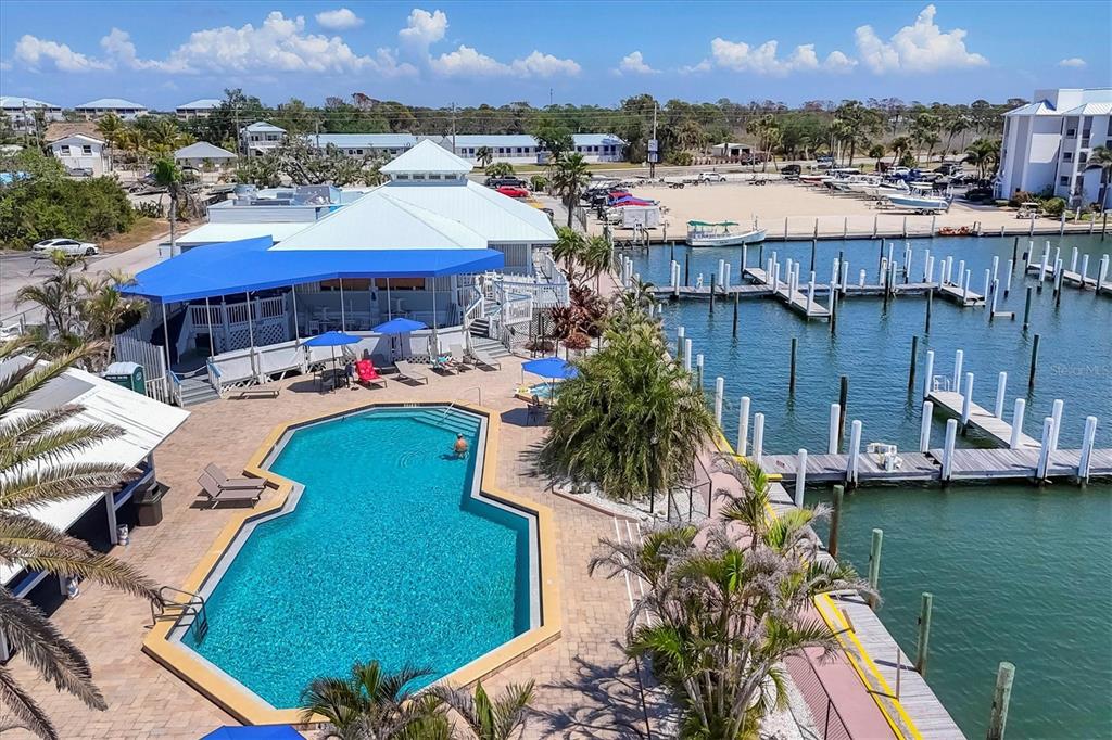 7070 Placida Road, Unit 1230 Placida, FL 33946 - Photo 58 of 60 an aerial view of a house with a garden and lake view