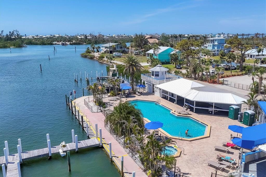 7070 Placida Road, Unit 1230 Placida, FL 33946 - Photo 60 of 60 a view of a city with lawn chairs