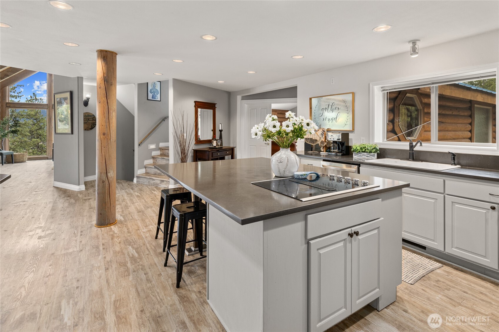 1161 White Road Cle Elum, WA 98922 - Photo 12 of 38 a kitchen with stainless steel appliances granite countertop a sink and a refrigerator