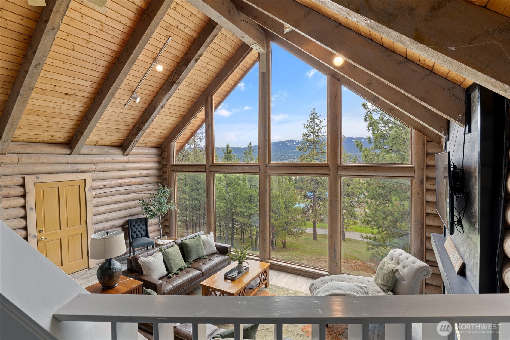 1161 White Road Cle Elum, WA 98922 - Photo 20 of 38 a living room with furniture and floor to ceiling windows