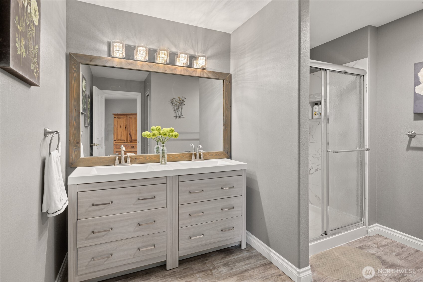 1161 White Road Cle Elum, WA 98922 - Photo 28 of 38 a bathroom with a granite countertop sink a mirror a vanity and a shower