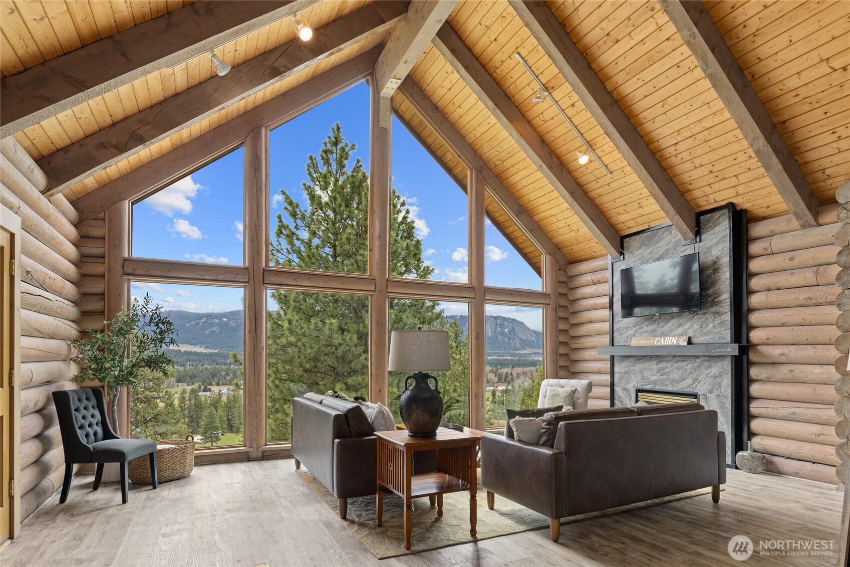 1161 White Road Cle Elum, WA 98922 - Photo 6 of 38 a living room with furniture and floor to ceiling windows