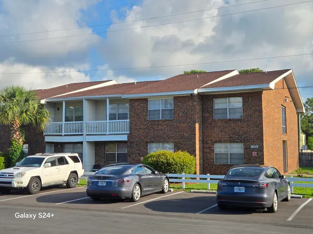 a car parked in front of a house