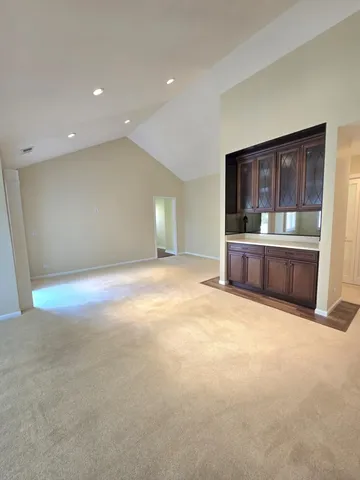 an empty room with entrance and door