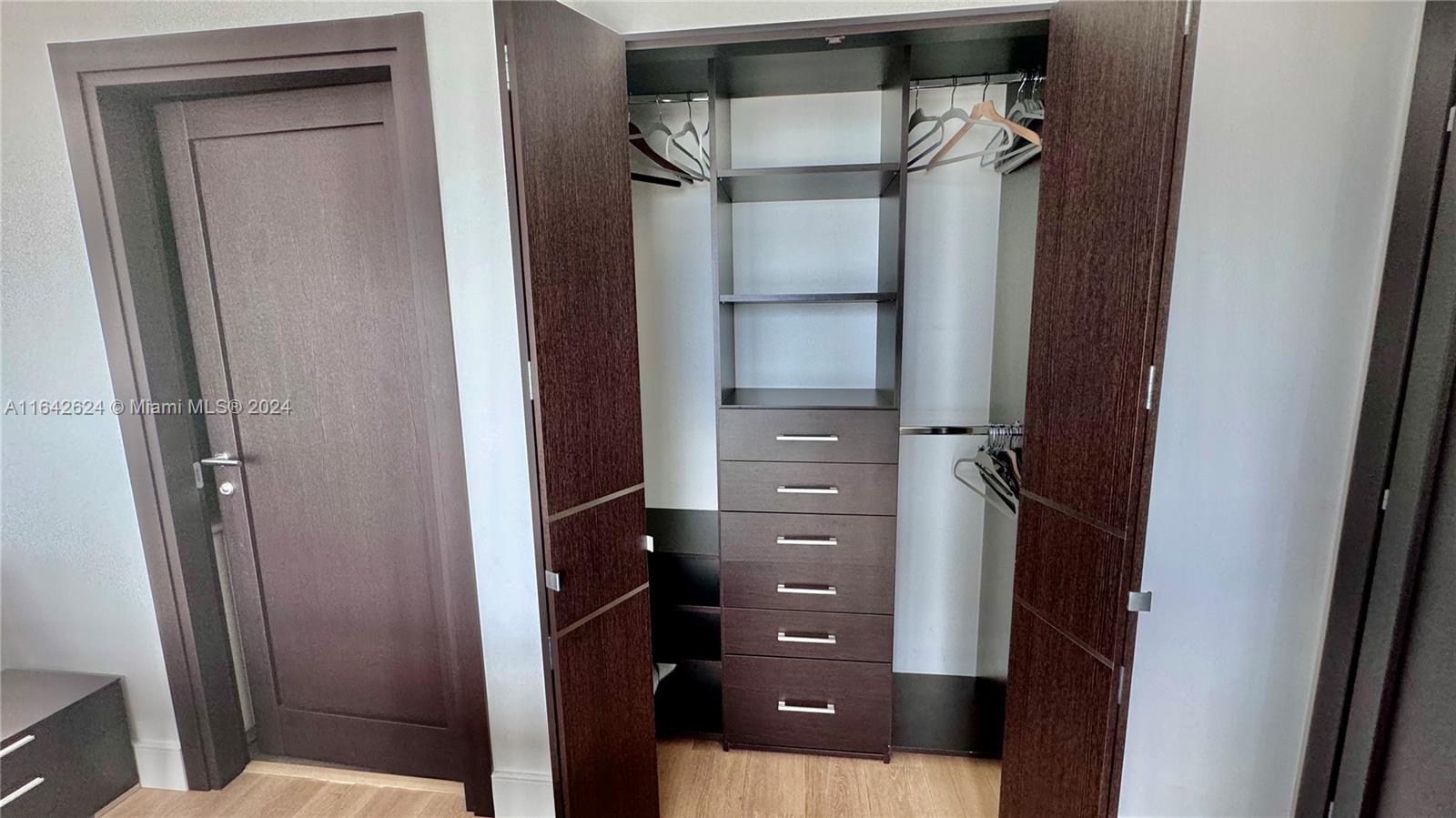 1331 Brickell Bay Drive, Unit 1109 Miami, FL 33131 - Photo 27 of 30 a view of walk in closet