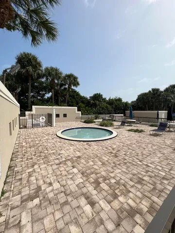 a view of swimming pool with a yard