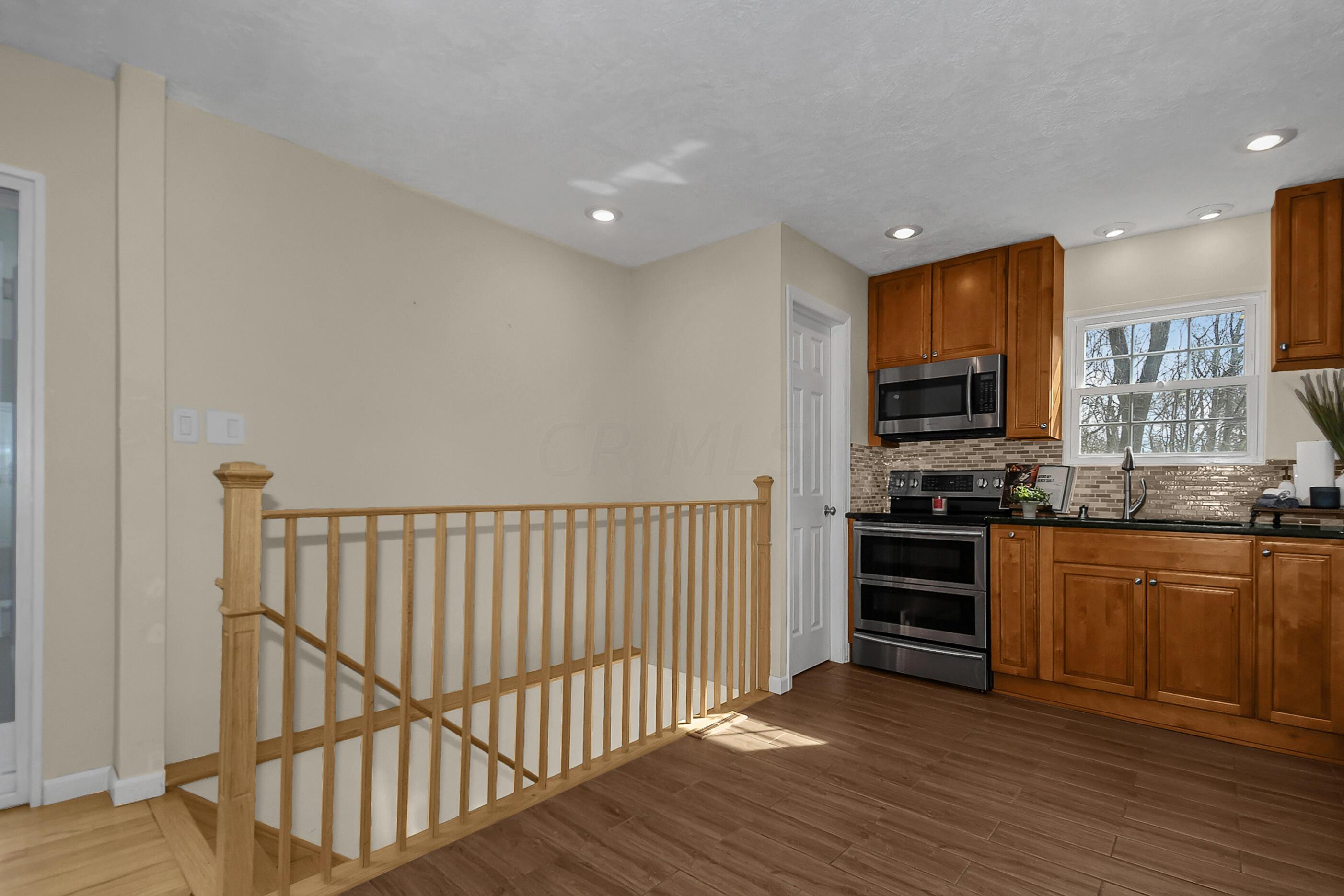 6200 Home Road Delaware, OH 43015 - Photo 22 of 36 Stairway to Lower Level