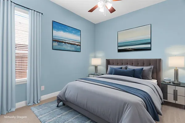 a bedroom with bed and a window