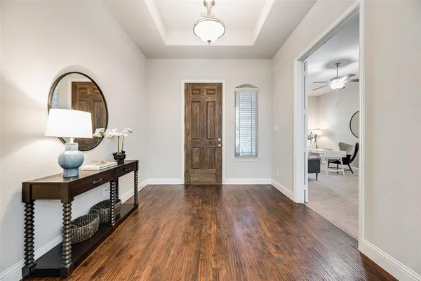 a view of living room with wooden floor